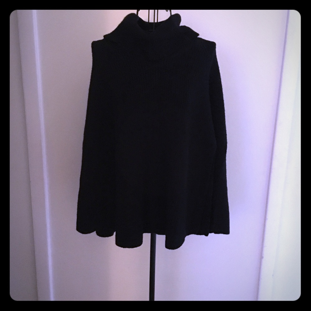 Black sweater poncho.